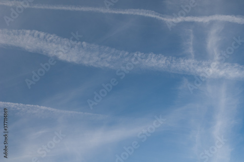 Contrails of airplanes in the sky of Huesca. Aragon. Spain.