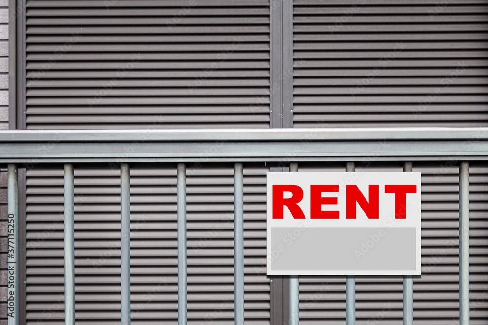 Rental Real Estate Sign in Front of house Rental Real Estate Sign in Front of house