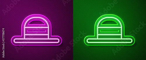 Glowing neon line Elegant women hat icon isolated on purple and green background. Vector.