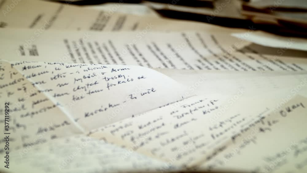 Scattered White Paper Printed Documents On Tabletop - Closeup Shot (Pan Right) Scattered White Paper Printed Documents On Tabletop - Closeup Shot (Pan Right)
