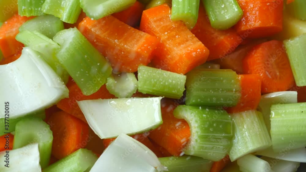 Preparing vegetables carrots and celery for baking Preparing vegetables carrots and celery for baking
