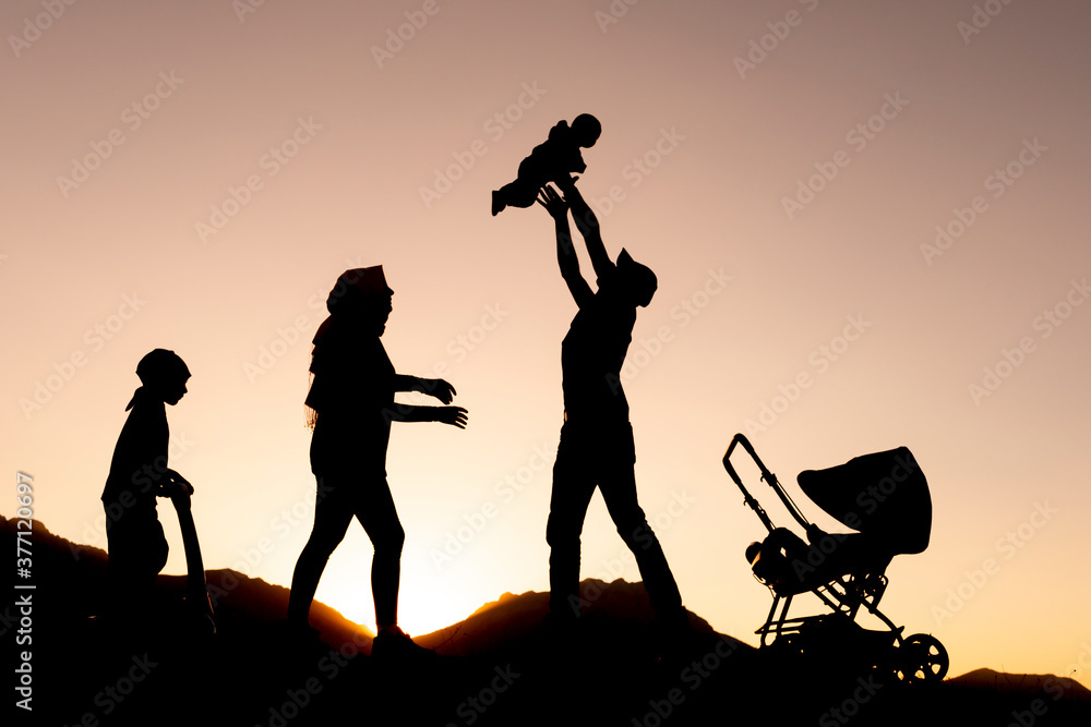 silhouette of happy family, they have fun and good time and they have a nice bond