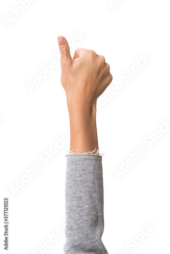 child's hand in fist with thumb open, white background