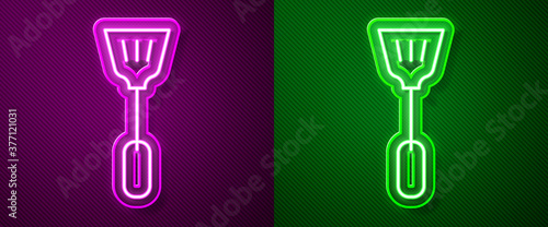 Glowing neon line Fly swatter icon isolated on purple and green background. Vector.
