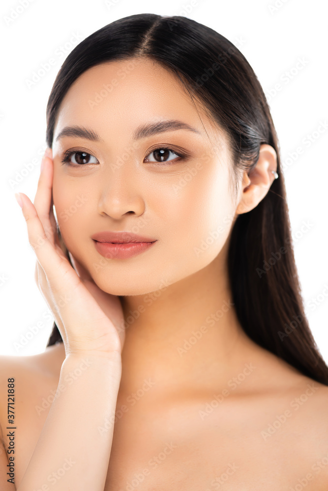 Asian woman looking away and touching face isolated on white Asian woman looking away and touching face isolated on white