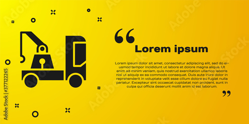 Black Tow truck icon isolated on yellow background. Vector Illustration.