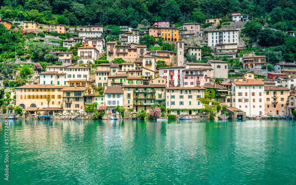 Scenic view of Gandria colorful fishing village houses on the shore of Lake Lugano on beautiful summer day Lugano Ticino Switzerland