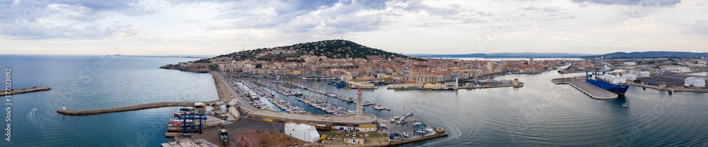 Aerial panorama of the city of Sète and Mont Saint Clair, on a very cloudy morning, in the Hérault department in Occitanie, France