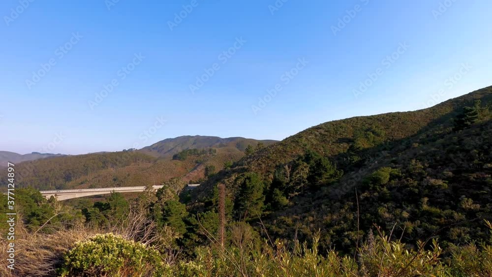 Slow Pan of Devils Slide State Park along the closed portion of Route 1 North of Half Moon Bay along the San Francisco coastline Slow Pan of Devils Slide State Park along the closed portion of Route 1 North of Half Moon Bay along the San Francisco coastline