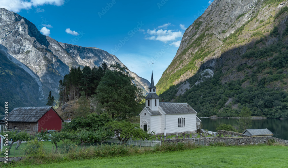 Undredal, a small fishing village on the shores of the Aurlandsfjorden, a branch off the massive Sognefjorden, Vestland, Norway, Home to the smallest stave church in Northern Europe, built in 1147