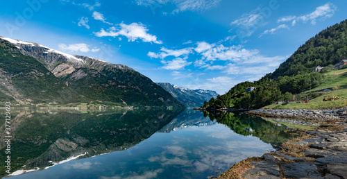 Breathtaking landscapes along the Hardanger fjord and its inner branches, in the traditional Hardanger district of Vestland in Norway.