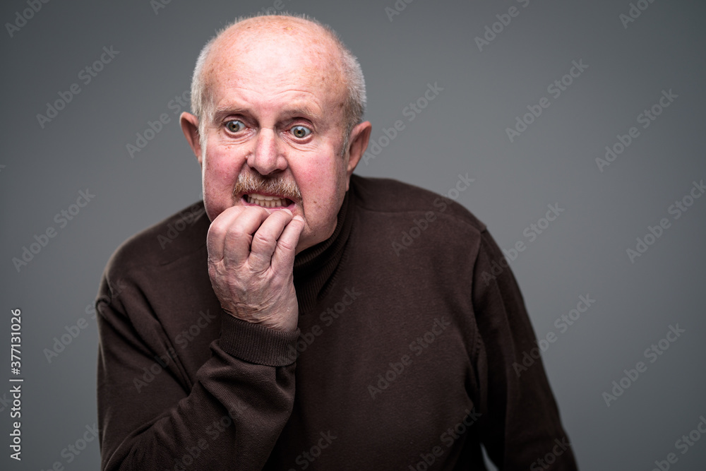 Senior man lonely at home, anxious/afraid to go out - self isolation/ quarantine due to COVID-19/ Coronavirus social distancing/prevention concept Senior man lonely at home, anxious/afraid to go out - self isolation/ quarantine due to COVID-19/ Coronavirus social distancing/prevention concept
