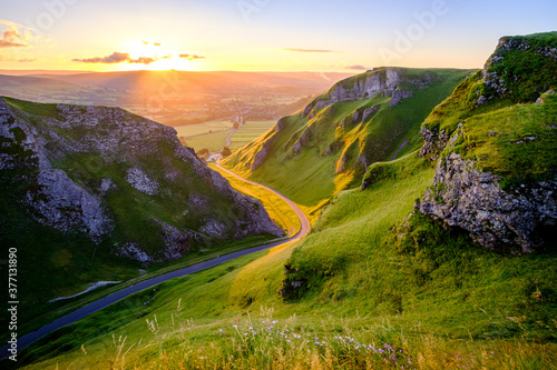 Golden Sunrise through Winnats Pass in the Peak District, Derbyshire, England