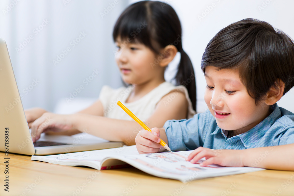 Little boy and girl doing homework Little boy and girl doing homework
