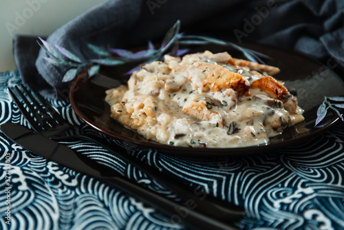 risotto with fresh cream, salted chicken, rehydrated ceps and mushrooms