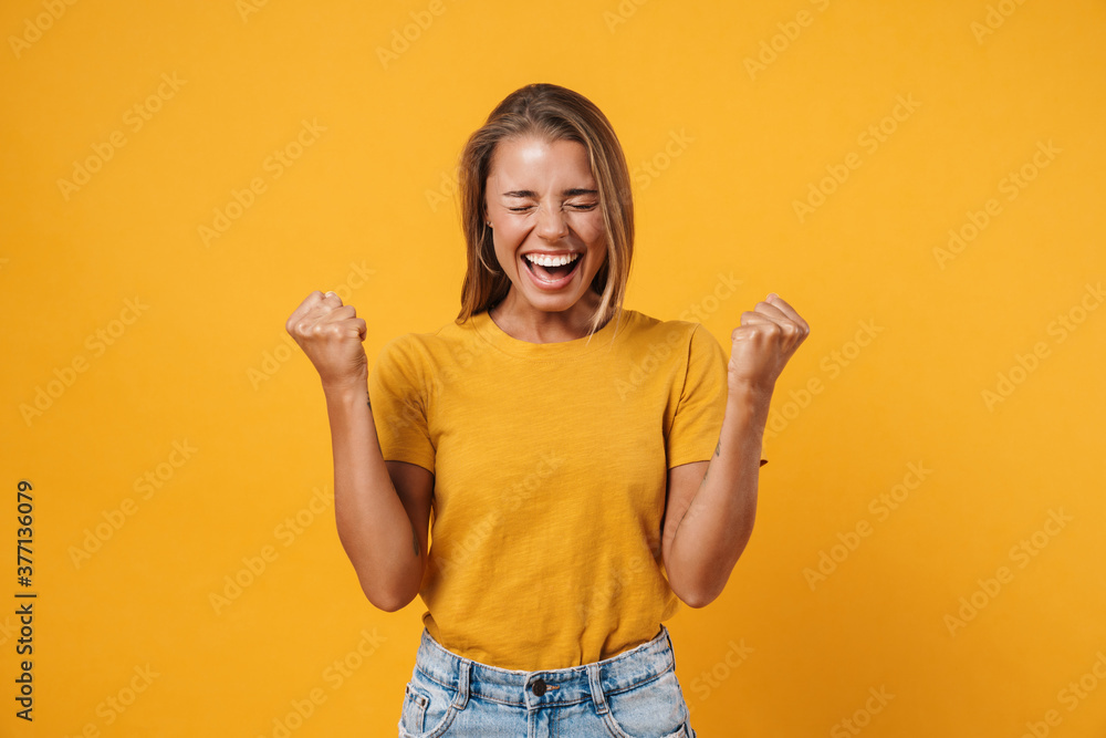 Happy pretty girl celebrating success isolated Happy pretty girl celebrating success isolated