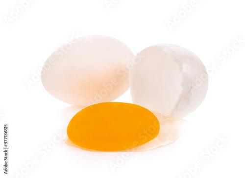 Broken duck eggs isolated on white background