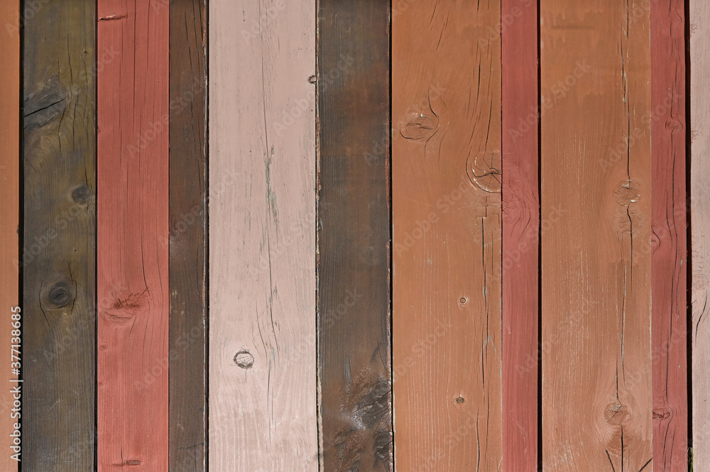 Fototapeta premium 少しずつ違う茶系の板が並んだ壁
