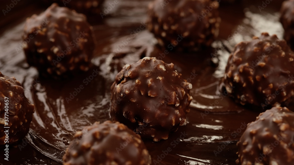 chocolate candies on melted chocolate chocolate candies on melted chocolate