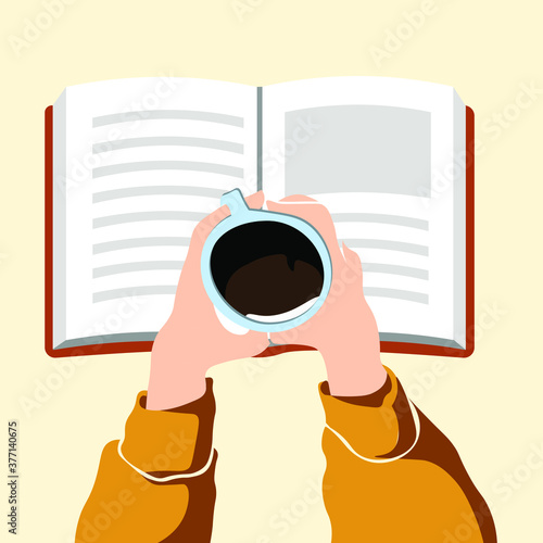 A cup of coffee in hands and a book. 
Education or reading concept