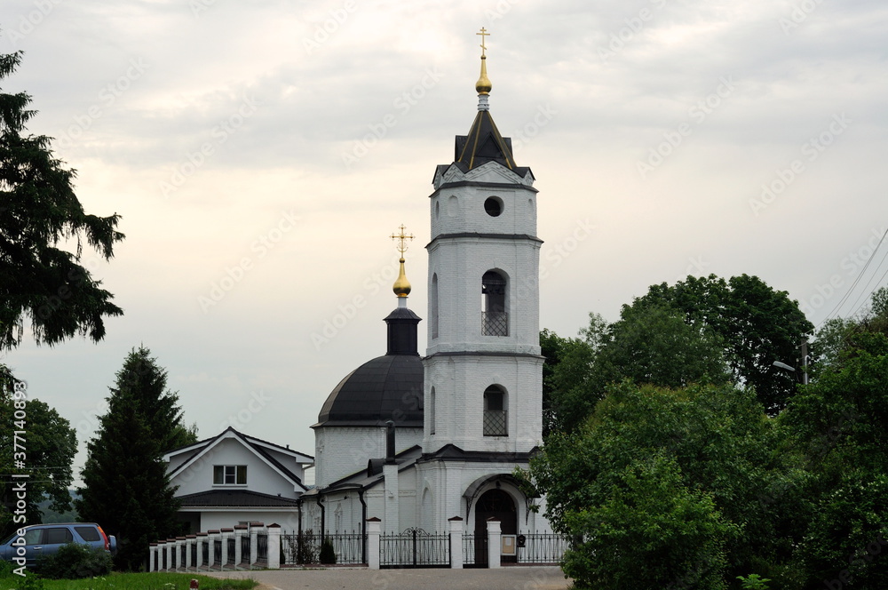 Orthodox Church of the assumption of the blessed virgin Mary on a cloudy summer morning. Moscow region. Russia.