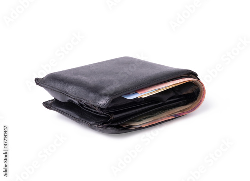 Isolated of old black leather wallet with money banknotes on white background. Clipping path.