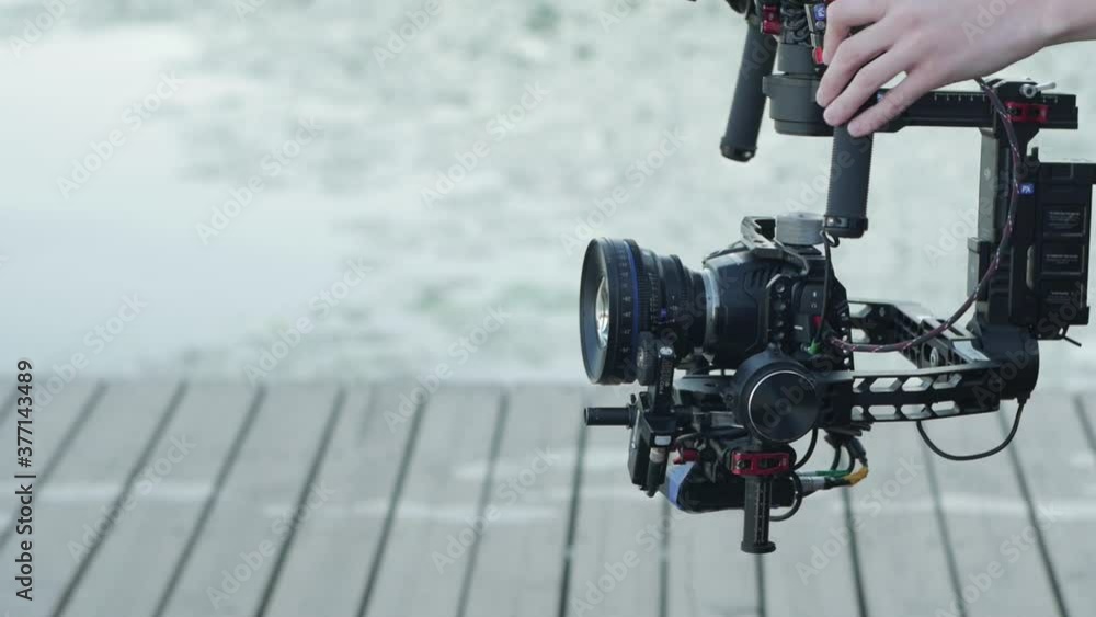 Production camera stabilizer equipment slow motion closeup Production camera stabilizer equipment slow motion closeup