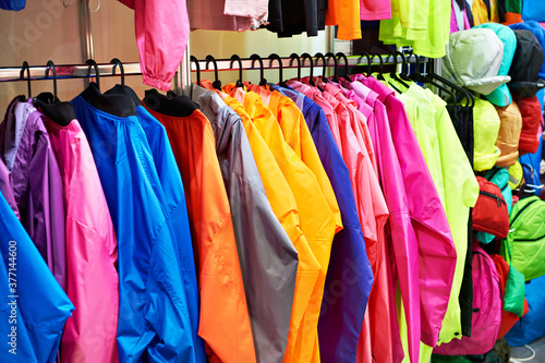 Colorful clothes on hanger in store