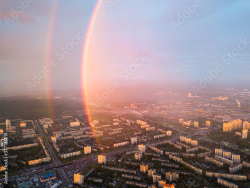 Aerial drone view. Double rainbow on a rainy evening over Kiev city.