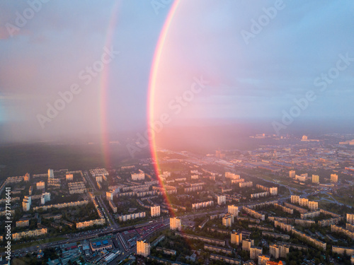 Aerial drone view. Double rainbow on a rainy evening over Kiev city.