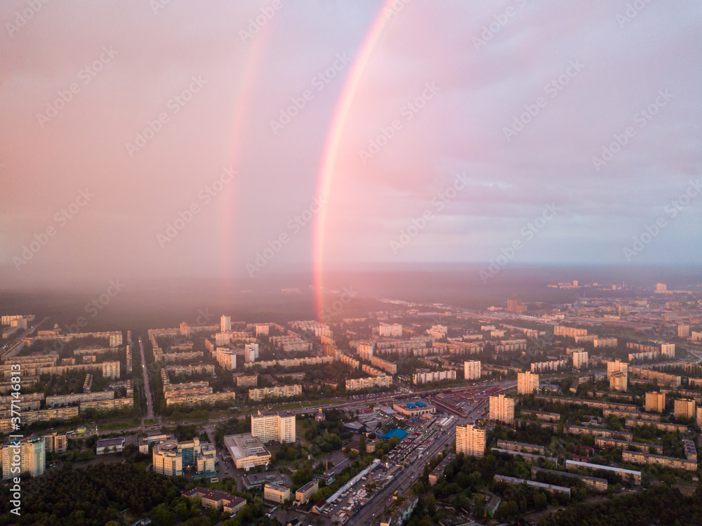 Aerial drone view. Double rainbow on a rainy evening over Kiev city. Aerial drone view. Double rainbow on a rainy evening over Kiev city.