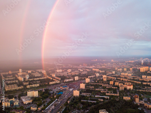 Aerial drone view. Double rainbow on a rainy evening over Kiev city.