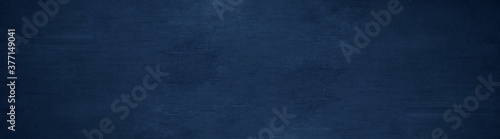 Dark abstract blue black painted stone concrete paper texture background panorama banner long, with space for text