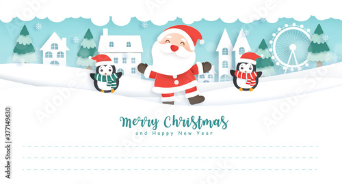 Merry Christmas and happy new year postcard with cute Santa and penguins in the snow vilage for greeting card . © Nattapohn