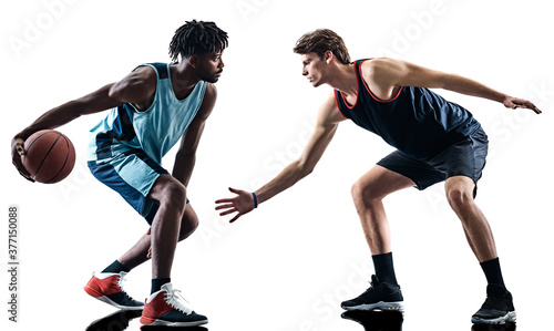 two basketball players men isolated in silhouette shadow on white background
