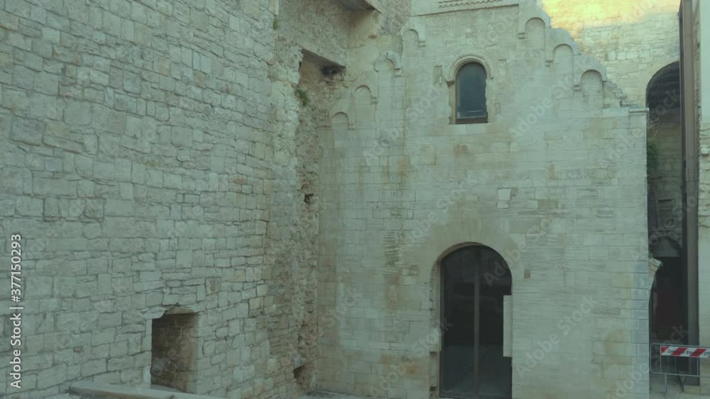 Bisceglie, Puglia, Italy - August 19, 2019: Chapel of San Giovanni in the courtyard of the Swabian castle Bisceglie, Puglia, Italy - August 19, 2019: Chapel of San Giovanni in the courtyard of the Swabian castle