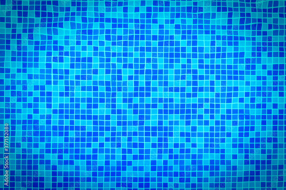 Top view, Blurred texture of swimming pool tiles for background or cover decorative. Top view, Blurred texture of swimming pool tiles for background or cover decorative.