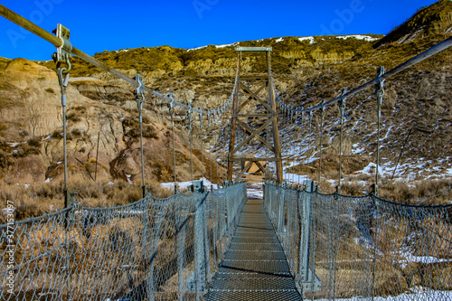 Susension bridge in a early spring. Drumheller Alberta, Canada. photo