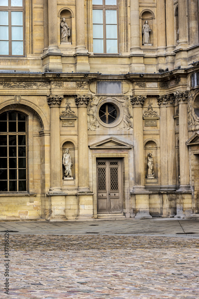 View fragments of Louvre buildings in Square Courtyard (Cour Carree) of ...