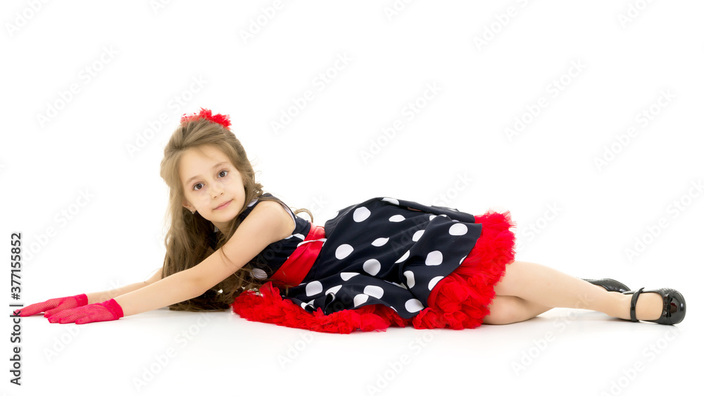 Girl in clothes in retro fashion style sitting on a white background Girl in clothes in retro fashion style sitting on a white background