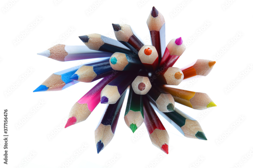 Group of colored pencils on white with selective focus Group of colored pencils on white with selective focus