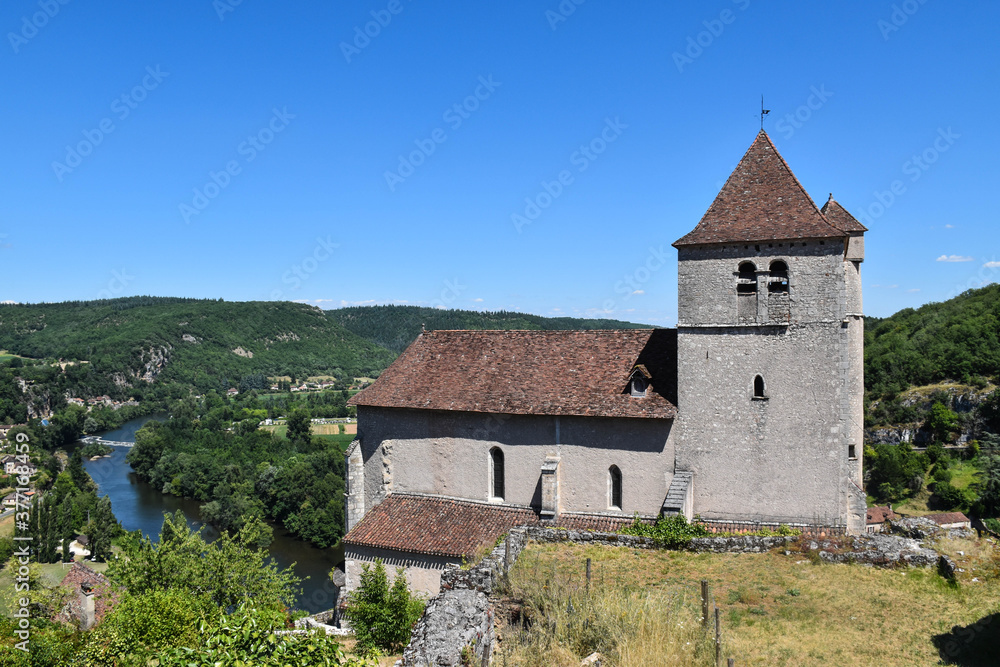 Church on top of a mountain with a mountain and natural landscape with a river
