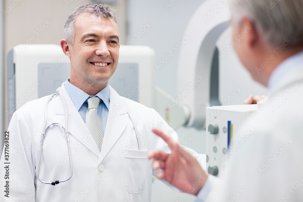 Doctors with MRI scanner Doctors with MRI scanner