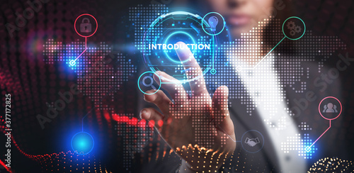 Wallpaper Mural Business, Technology, Internet and network concept. Young businessman working on a virtual screen of the future and sees the inscription: Introduction Torontodigital.ca