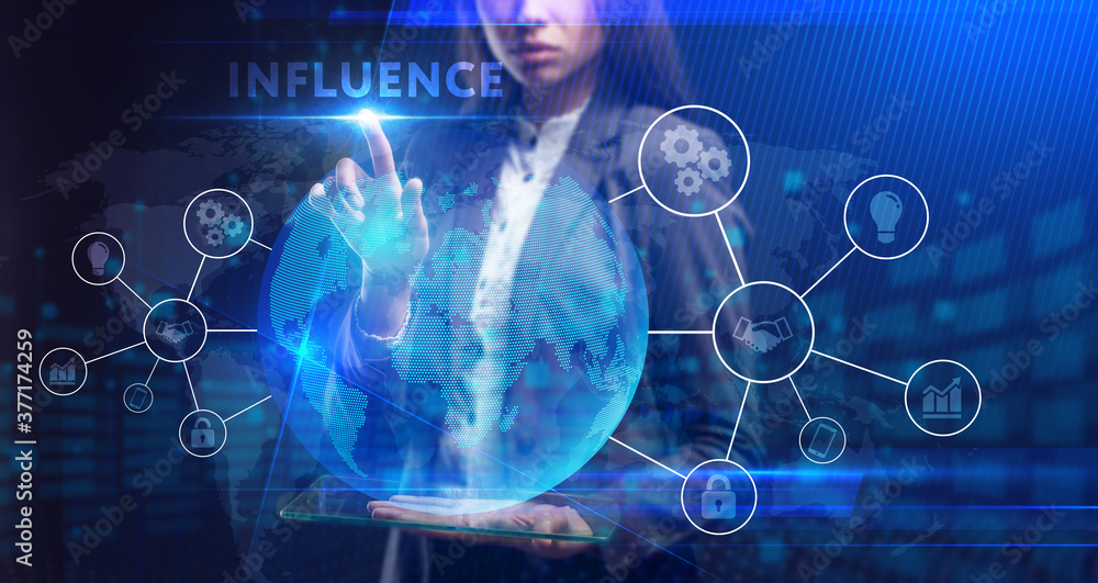 Business, Technology, Internet and network concept. Young businessman working on a virtual screen of the future and sees the inscription: Business, Technology, Internet and network concept. Young businessman working on a virtual screen of the future and sees the inscription: