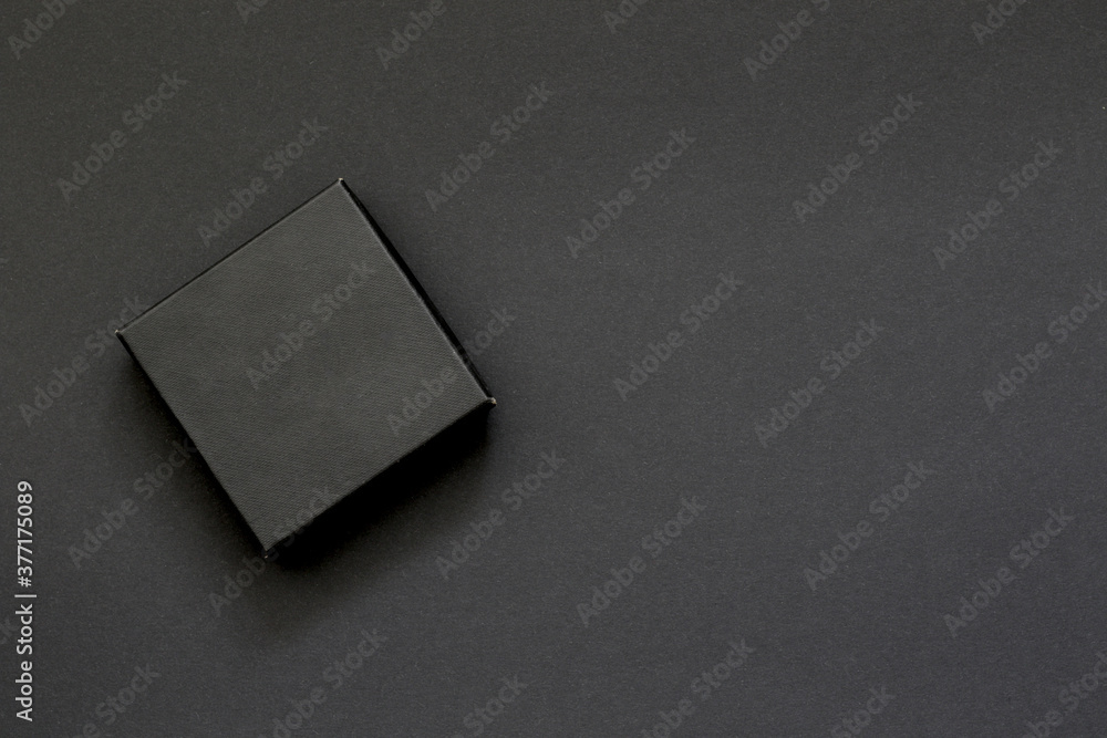 small black box on black background small black box on black background