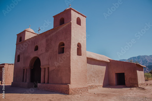 Pink Church. Adobe Road, in Catamarca, Argentina