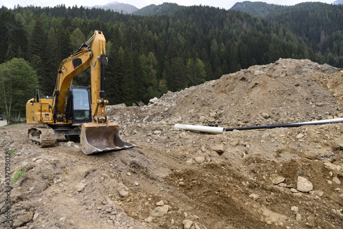 escavatore scavo edilizia scavare terra terreno edilizia costruzione industria  photo