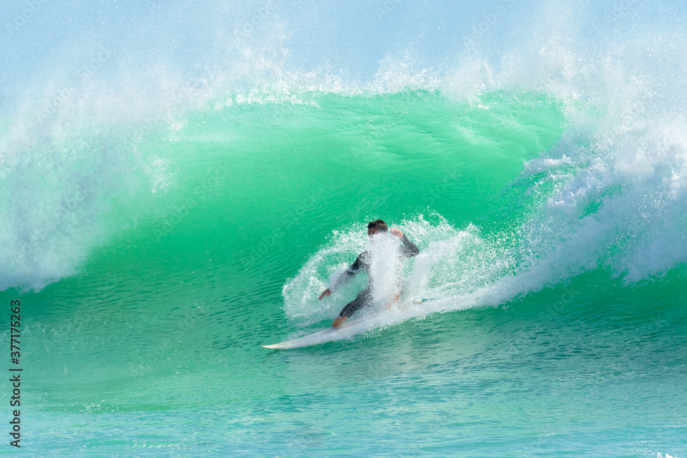 © Ibex.media/Stocksy - Surfer riding waves © Ibex.media/Stocksy - Surfer riding waves