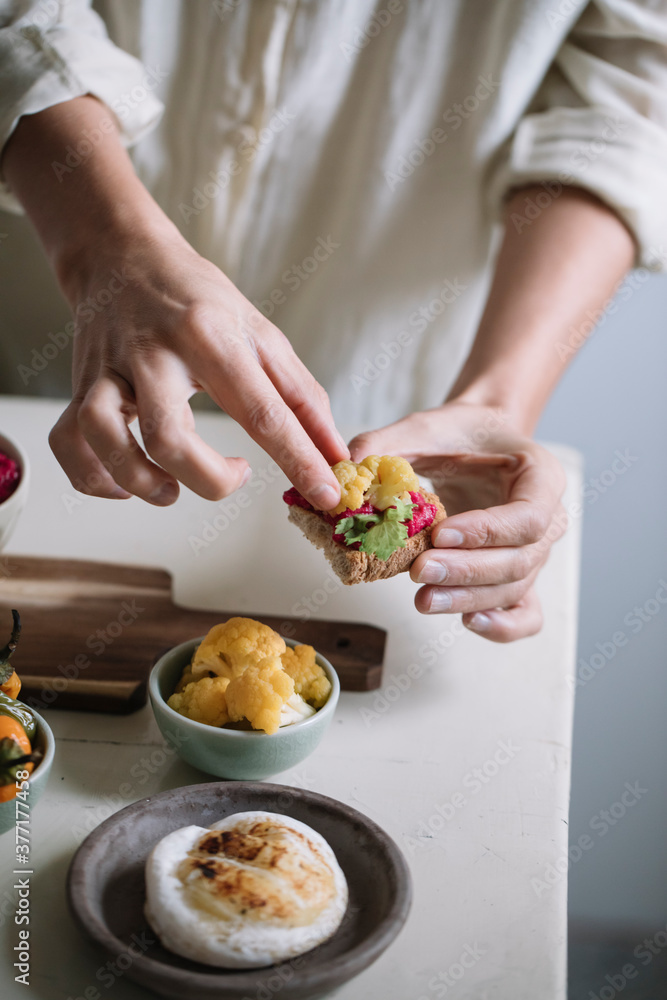 Woman Preparing Vegetable For Dinner Woman Preparing Vegetable For Dinner